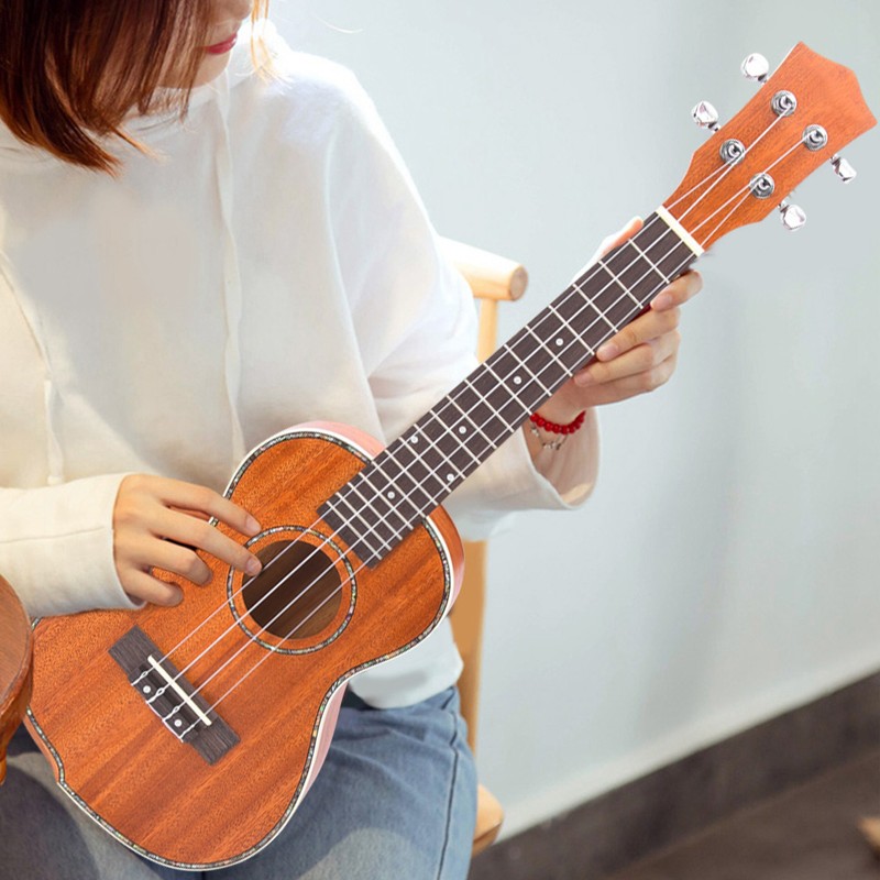 23in Ukulele Brown Mahogany Wood with Bag Capo String Cleaning