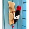 Red-headed woodpecker door knocker