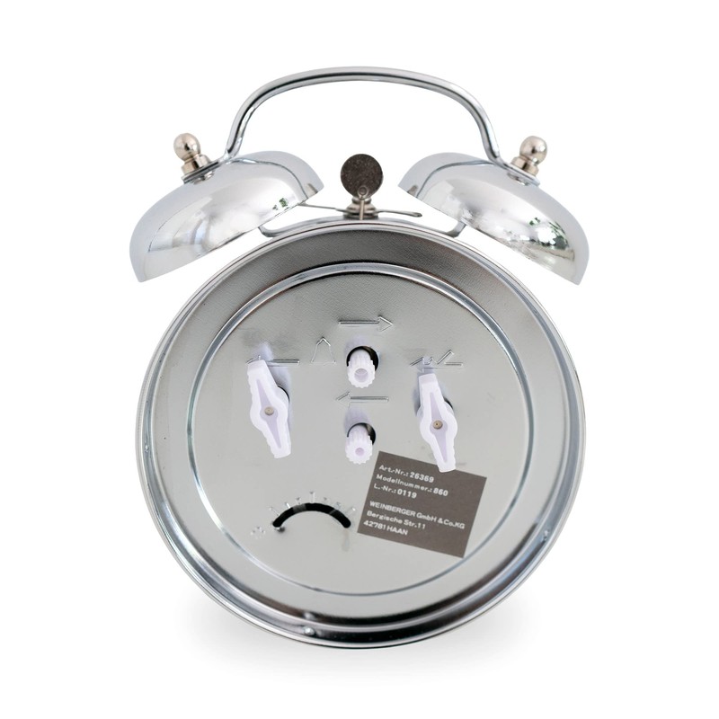 Mechanical lift alarm clock with classic bell ringer, illuminated hands