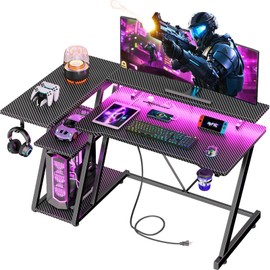 39 Inch Gaming Desk with Power Outlet & LED Lights, L Shaped Computer Gaming Table with 3 Tiers Storage Shelves, Corner Gamer Desk with Monitor Stand for Small Space, Carbon Fiber Black