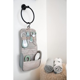 Béaba Baby Travel Toiletry Bag - 9 Accessories Including Bath Thermometer, Digital Thermometer, Teething Ring, Gum Massager, Bow Tie, Manual, Sage Green