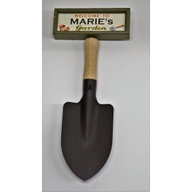 "Welcome to Marie's garden" hanging shovel sign
