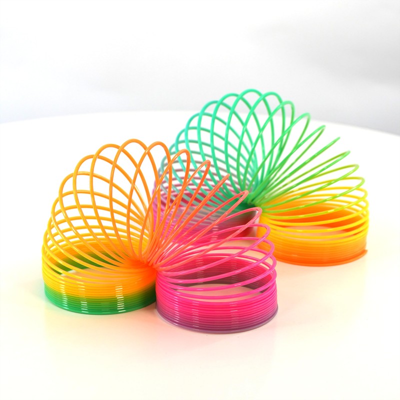 12 x LARGE Rainbow Springs Plastic Magic Slinky Spring Toy