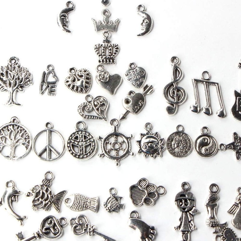Set de 100 Piezas de Dijes Tibetanos accesorios de plata