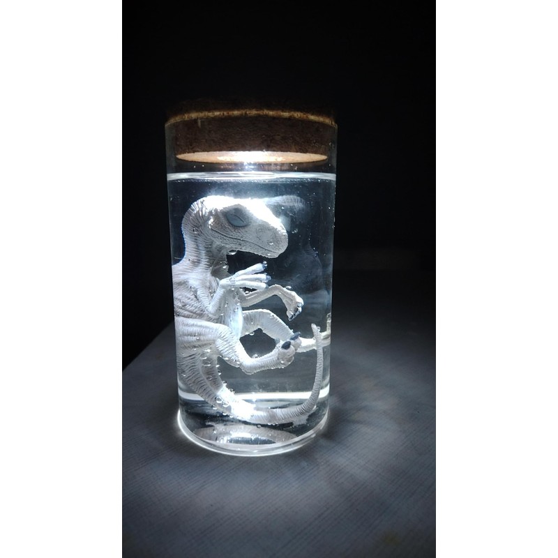 Unique Dinosaur in Glass Bottle Figurine - A Touch of