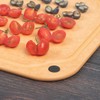 CompactStone all-around chopping board with antiskid feet and juice tank