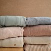 Mushie Fitted Crib Sheet | Extra Soft Muslin Crib Sheet