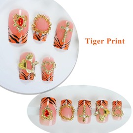 MERVF Square Press on Nails Medium Fake Nails Orange Tiger Print French Tip Glue on Nails with Gold Charms Press ons Heart Rose Cross Acrylic False Goth Squoval Nails for Women Glossy 24pcs