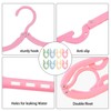 16 x Foldable Hangers with Non-Slip Surface in Four Colours,