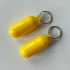 Rosojodg 2 Pcs Bright Yellow Buoy Floating Key Chain Pills-Shape Float Key Rings for Boat Sailings Kayak Surfing Water Sports Floating Chin Sports Fan Key Chains Car Keychains Interior Accessories