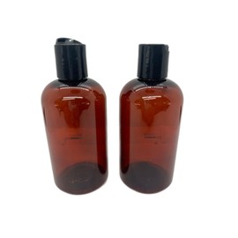 Caribbean Coastal Delights 4 oz Amber Plastic Bottle with Black Disc Cap - 2 Pack - BPA-Free and Break-Resistant - Perfect for Lotions, Creams, and Beauty Essentials