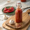 Hot Ones Pickled Garlic Sriracha Hot Sauce | Spicy, Savory
