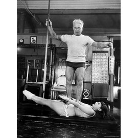 ART.COM Wall Premium Photographic Print Opera Singer Roberta Peters Balancing Her Trainer, Joseph Pilates, on Her Operatic Breadbasket by Michael Rougier, 24" x 32"