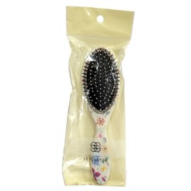 ( ) Cleans up neatly. Oval cushion hair brush in white. / ( )깔끔하게 정리돼요 타원형 쿠션 헤어브러시 중 화이트