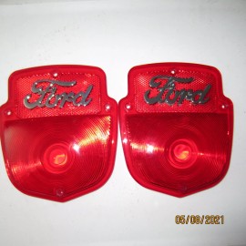 Ford 1953-60 Ford F-100 tail light lenses with chrome metal Ford script, new pair.