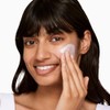 NeoStrata - Protector solar facial abrillantador de piel de amplio
