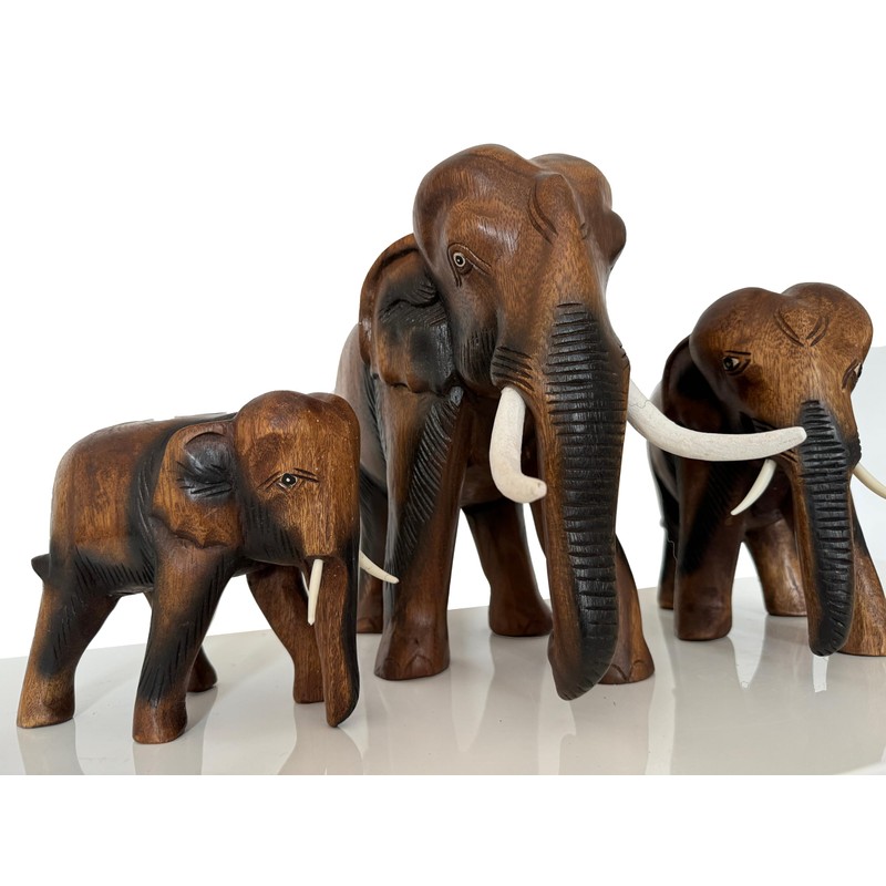 Crafty Artisan Hand carved wooden elephants ornaments for the home