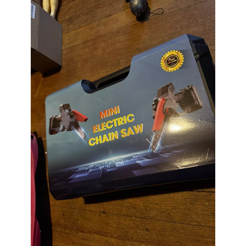 Unbranded Mini 6" Chainsaw / New / Two Batteries