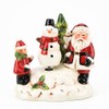 North Pole Novelties Ceramic Musical Santa with Snowman Ornament 13.5cm