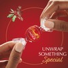 Lindt LINDOR Holiday Milk Chocolate Candy Truffles Wrapped Gift Box,