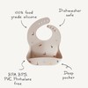 mushie Silicone Baby Bib | Adjustable Fit Waterproof Bibs (Pretzel)