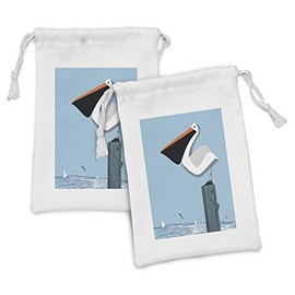 Lunarable Pelican Fabric Pouch Set of 2, Pelican Stands on a Wooden Column at the Sea Jumping Fish on Blue Sky Background, Small Drawstring Bag for Toiletries Masks and Favors, 9" x 6", Multicolor