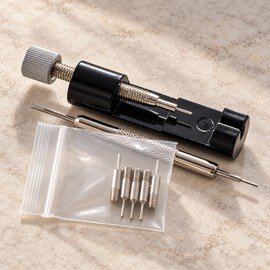 7-Piece Watch Band Link Removal Kit with Spring Bar Tool and Spare Pins, Black