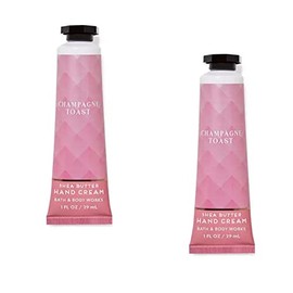 Bath & Body Works Crema De Manos Con Manteca De Karité, Tamaño De Viaje, 1 Onza Líquida, Paquete De 2 (Tostada Con Champán) Brindis Con Champán 1 Onza Líquida (Paquete De 2)