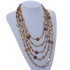 Avalaya Long Multistrand, Layered Dark Brown, Golden Brown Sea Shell