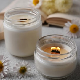 Meanplan 60 Pack 2 oz Glass Jars with Lids Bulk Small Sample Candle Cosmetic Jars with Inner Liners for Travel Empty Salve Tins Storage Container for Creams, Lotion, Candle Making, Food (White Black)