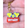 Toy Story Logo Word Charm Gold Zipper Pull & Keychain