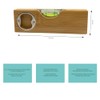 Spirit level with bottle opener with the words "Bester Papa