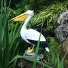 Homestyles 20 in. Pelican on Ocean Coastal Rock Collectible Beach