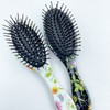 Oval Floral Seven Star Hairbrush (Small) 1 White