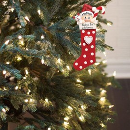 Baby's First Christmas,Celebrate new beginnings with adorable ornaments for 2023, including a polyresin red baby stocking and a grandbaby keepsake ornament