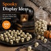 Derkiua 100pcs Mini Plastic Skull Heads for Halloween Decorations