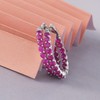 Femme Luxe created ruby gemstone Inside-Out hoop earrings in silver,