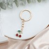MUCOOS Small cherry key ring, decorated with delicate small rhinestones,