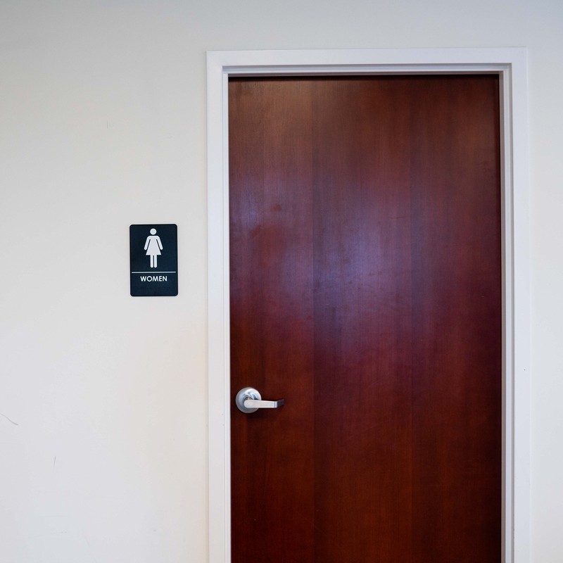 Rock Ridge Women's Restroom Sign ADA-Compliant Bathroom Door Sign for