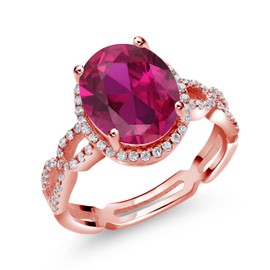 Gem Stone King 4.55 Cttw 18K Rose Gold Plated Silver Red Created Ruby and White Created Sapphire Ring For Women | Oval 11X9MM | Available In Size 5, 6, 7, 8, 9