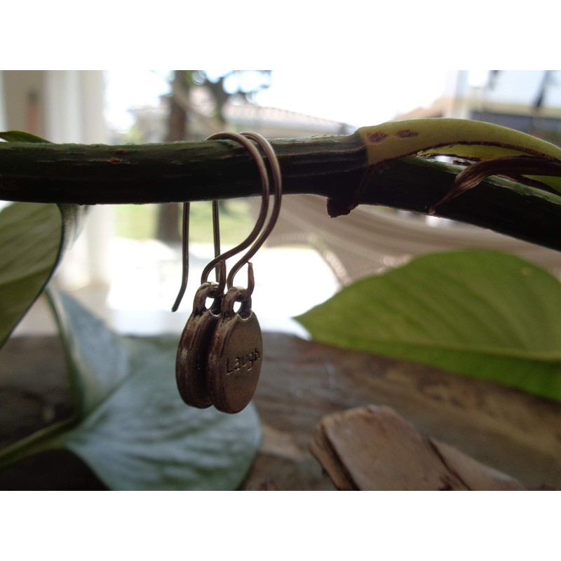 Laughing silver oval thick plates on long self-curved hooks