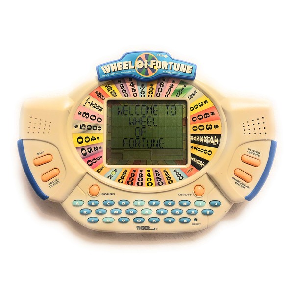 WHEEL OF FORTUNE DELUXE HANDHELD by Tiger Electronics