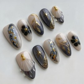 24Pcs Black Cat's Eye Press on Nails Medium Almond Fake Nails French Tip Acrylic Nails with Gold 3D Designs Glitter False Nails for Women