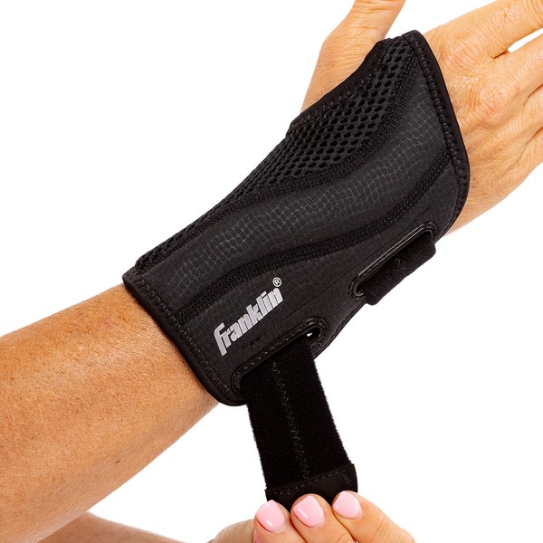 Franklin Sports Wrist Brace and Stabilizer - Adjustable Sports Wrist Guard - Wrist Compression Brace for Pain Relief + Injury Prevention - One Size