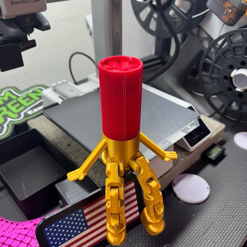 3d Printed Shot Shell Buddy with articulated legs and hidden