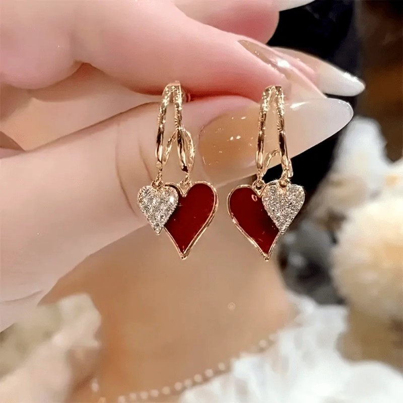 Distinctive Heart-Shaped Dangling Earrings with a Glossy End, Elegantly Easy