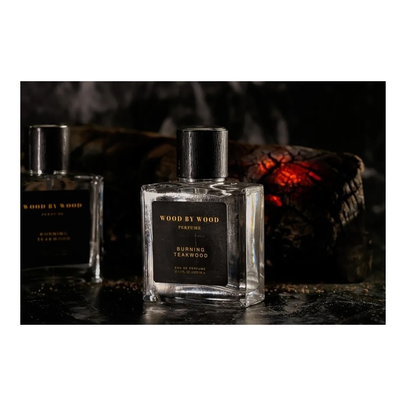 A burning bonfire, the scent of wet firewood.Burning Teakwood /