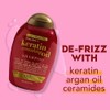 OGX Champú de aceite alisador sin frizz queratina, 5 en