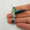 HAISWET - Broche esmaltado con diseño de colibrí con diamantes