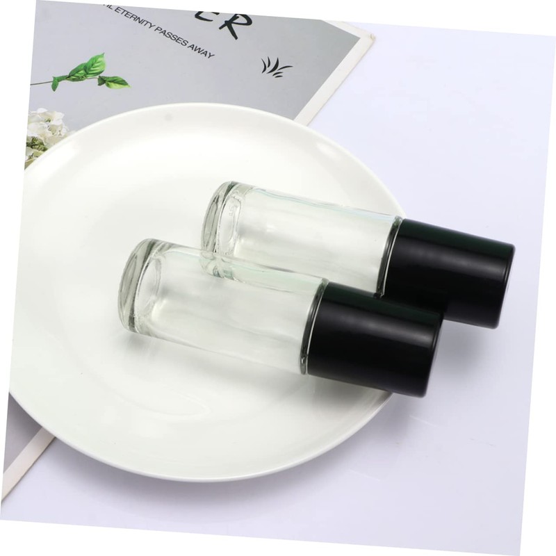 SAFIGLE 4Pcs Portable Roll Bottle Leak Empty Essential Oil Container